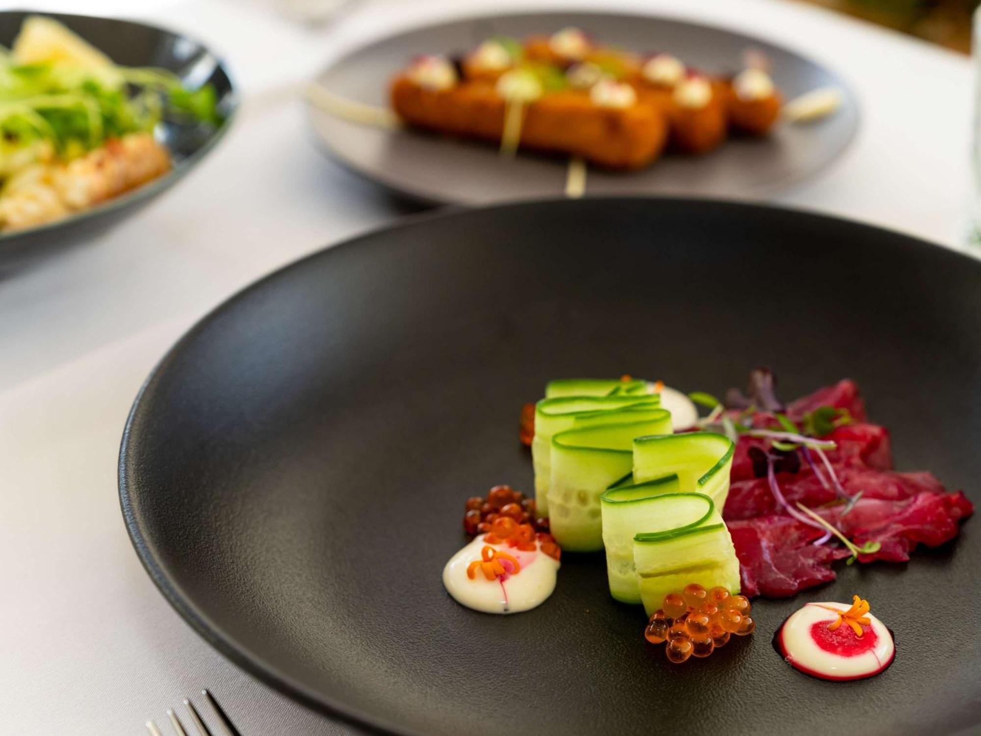 Pullman Cairns International Hotel Eksteriør billede A plate of food at the restaurant